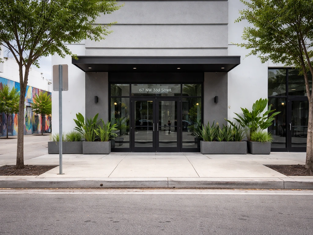 Street-level view of 167 NW 23rd Street in Wynwood, highlighting the entrance on NW 23rd Street.