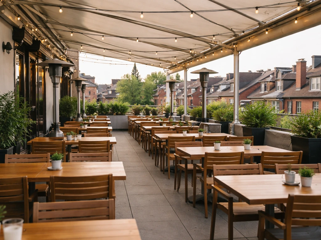 Vivoli-style rooftop patio in Toronto’s Little Italy with covered seating and warm evening ambiance.